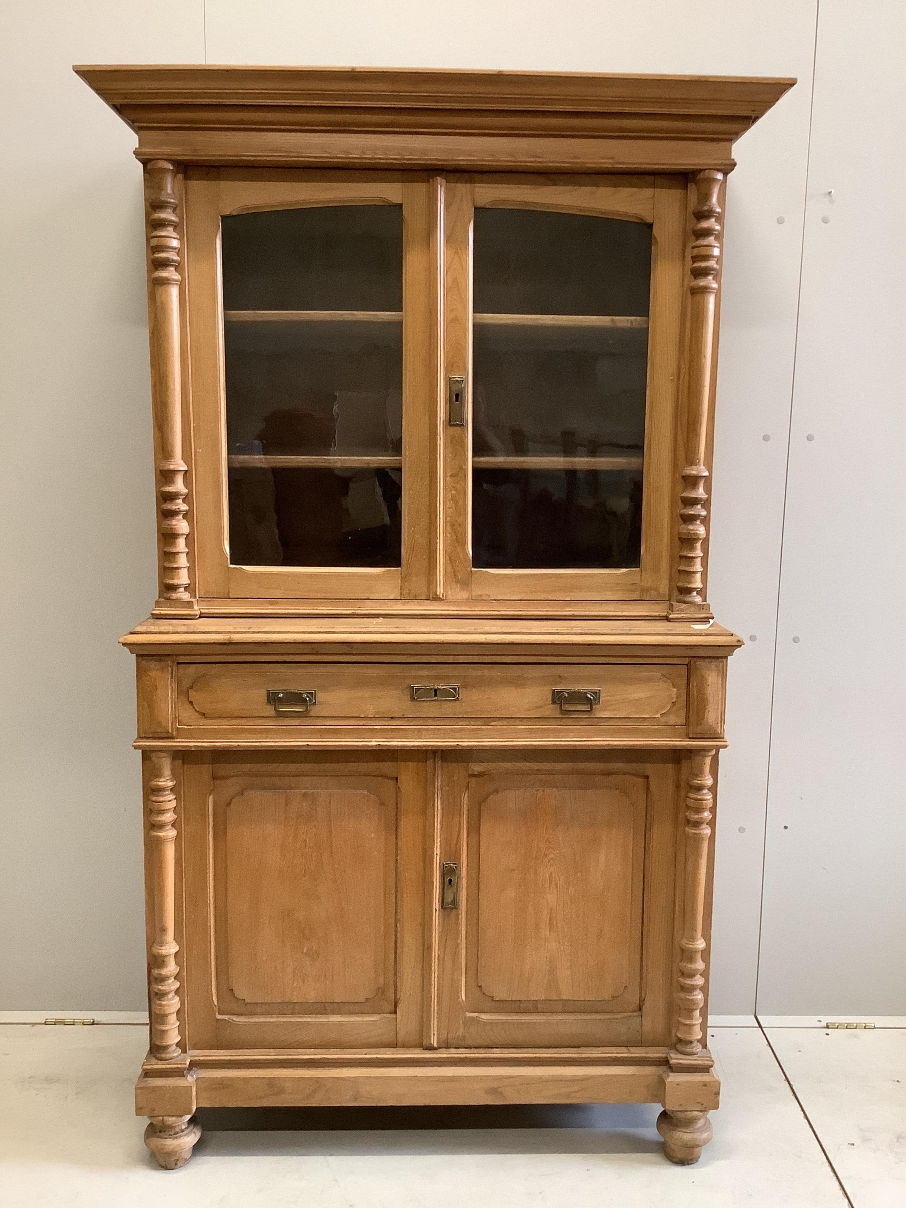 A late 19th century Belgian elm cupboard, width 115cm, depth 50cm, height 190cm